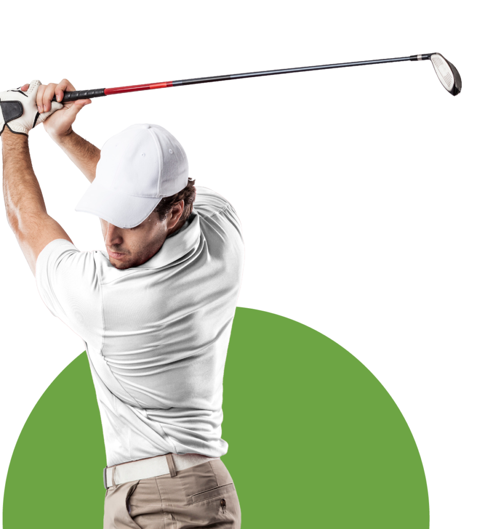 A male golfer in mid-swing, isolated on a white background, dressed in casual golf attire and holding a golf club.